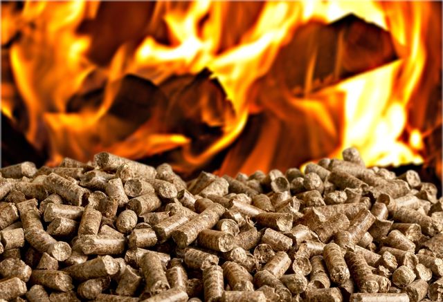 Burning biomass pellets